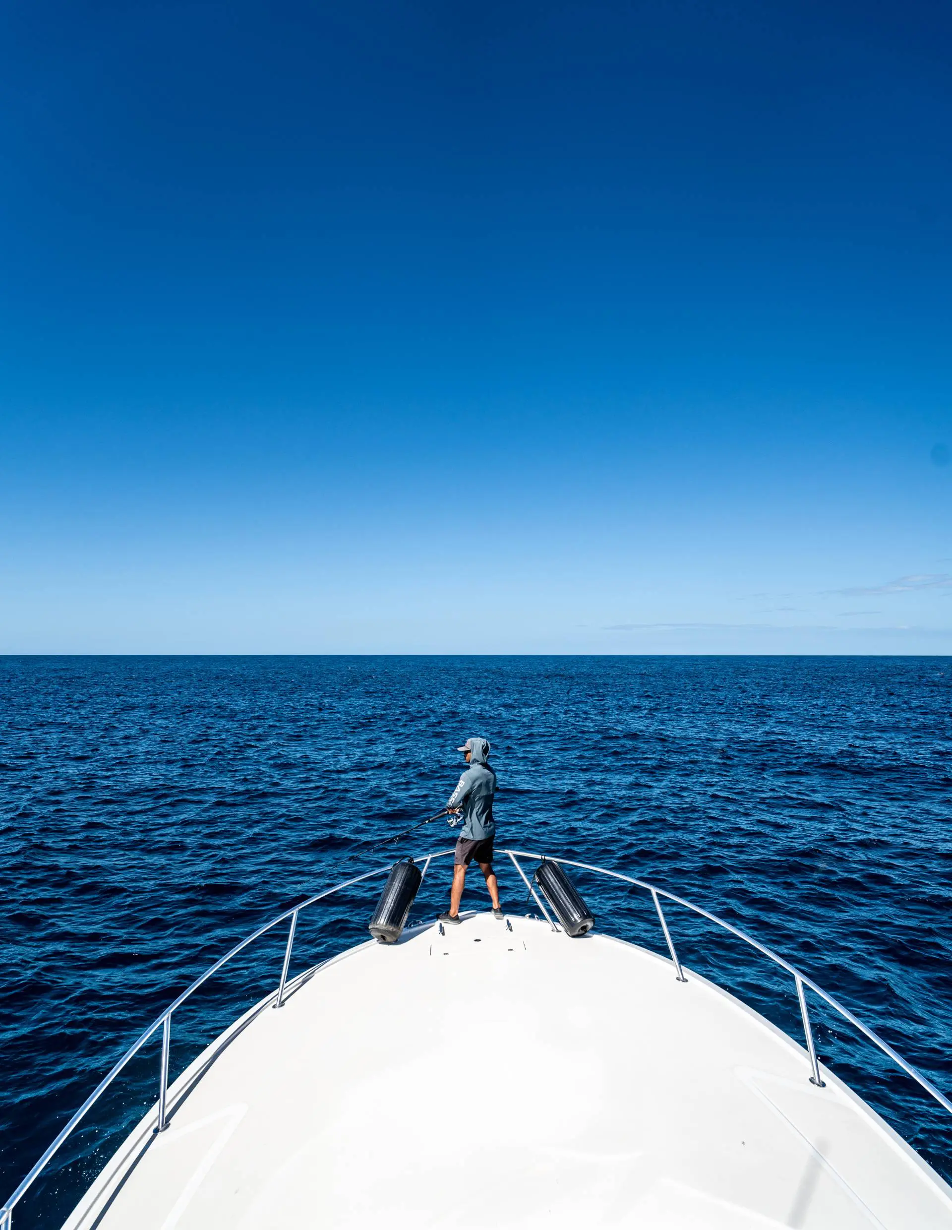 Man fishing onboard Chino Salsa charter boat
