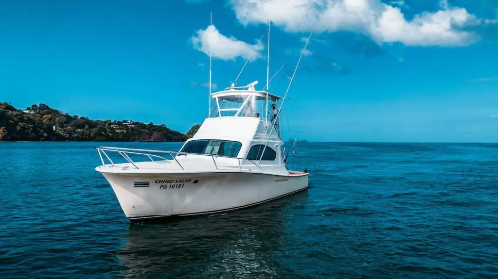 Chino Salsa best fishing charter boat in Costa Rica sailing on beautiful blue waters, offering deep sea fishing charter boat adventures and premium charter boat fishing experiences